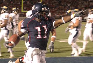 Mike Bell RB for the UA opens the scoring for Southern Arizona against the visiting Northern Arizona Lumberjacks.